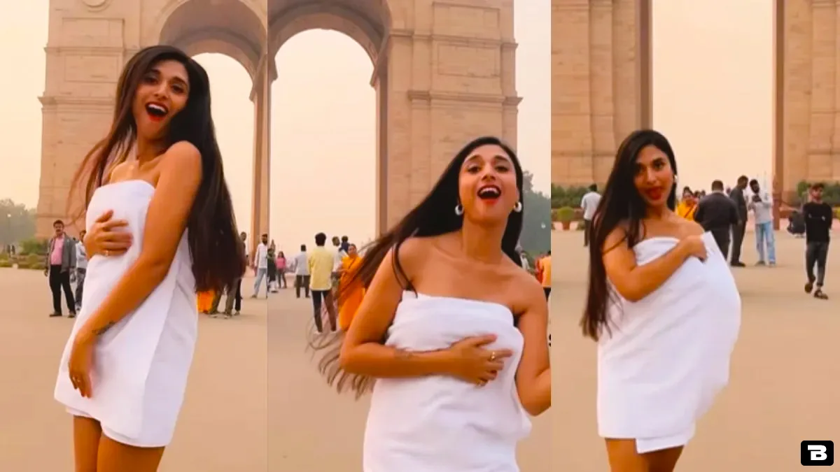 girl in towel dances india gate