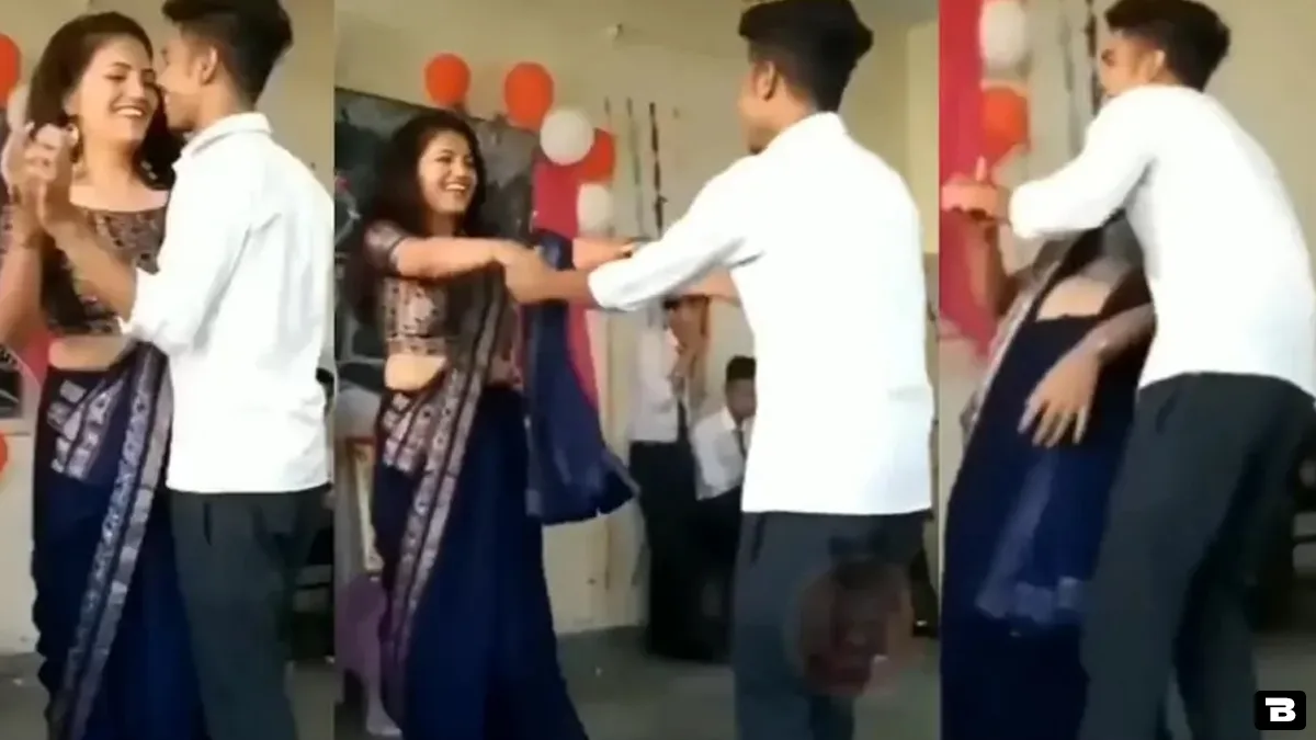 teacher grooves with student inside classroom