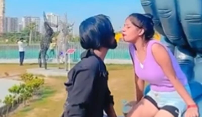 couple drinking water from each other's mouth noida