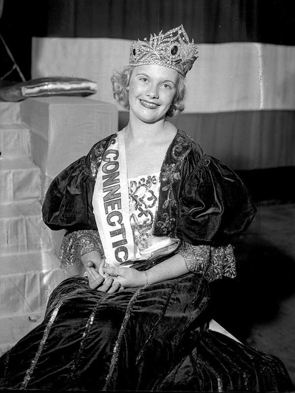 Bergeron smiling and wearing her crown